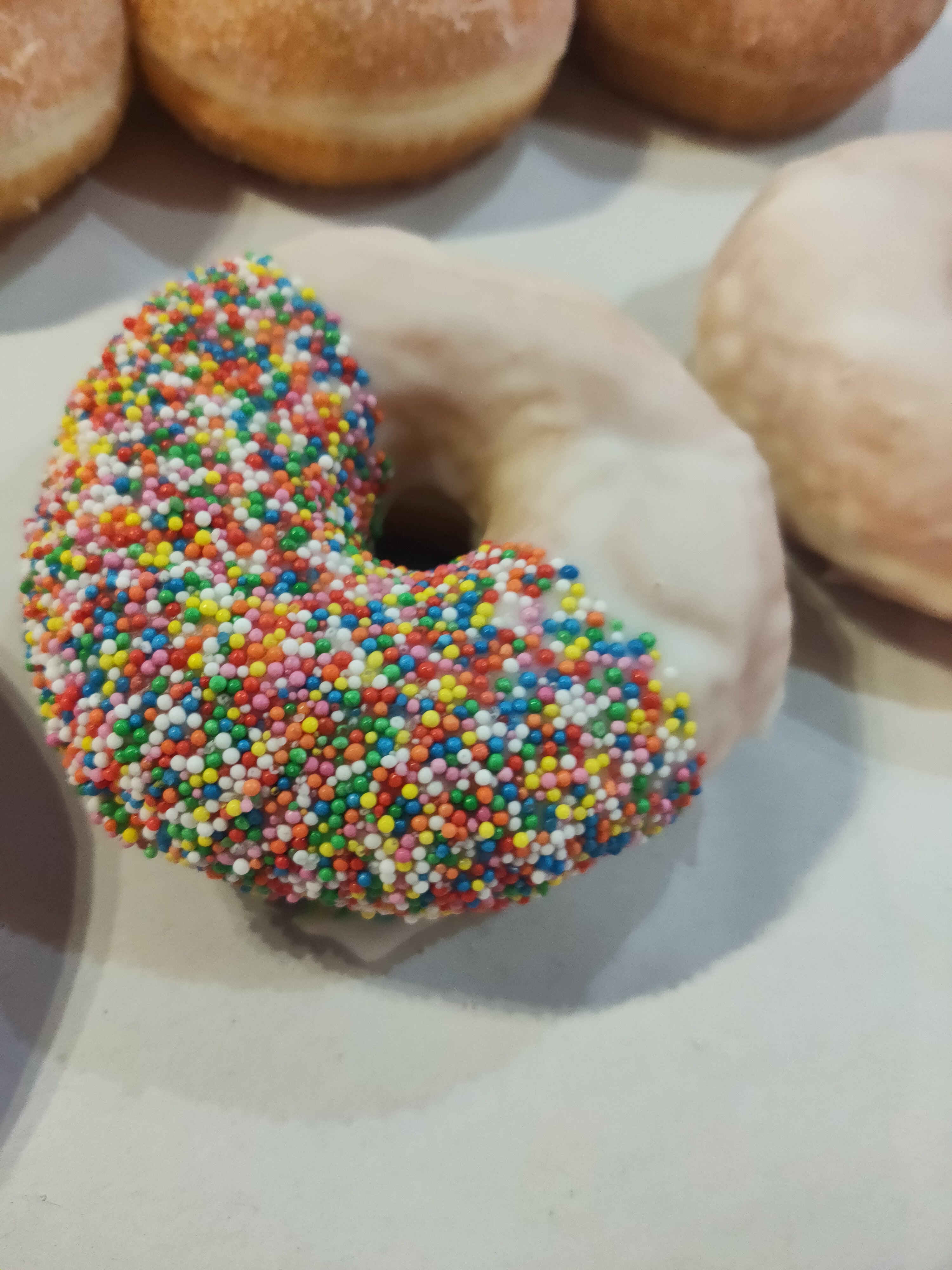 Large Vanilla sprinkle Glazed Ring donut